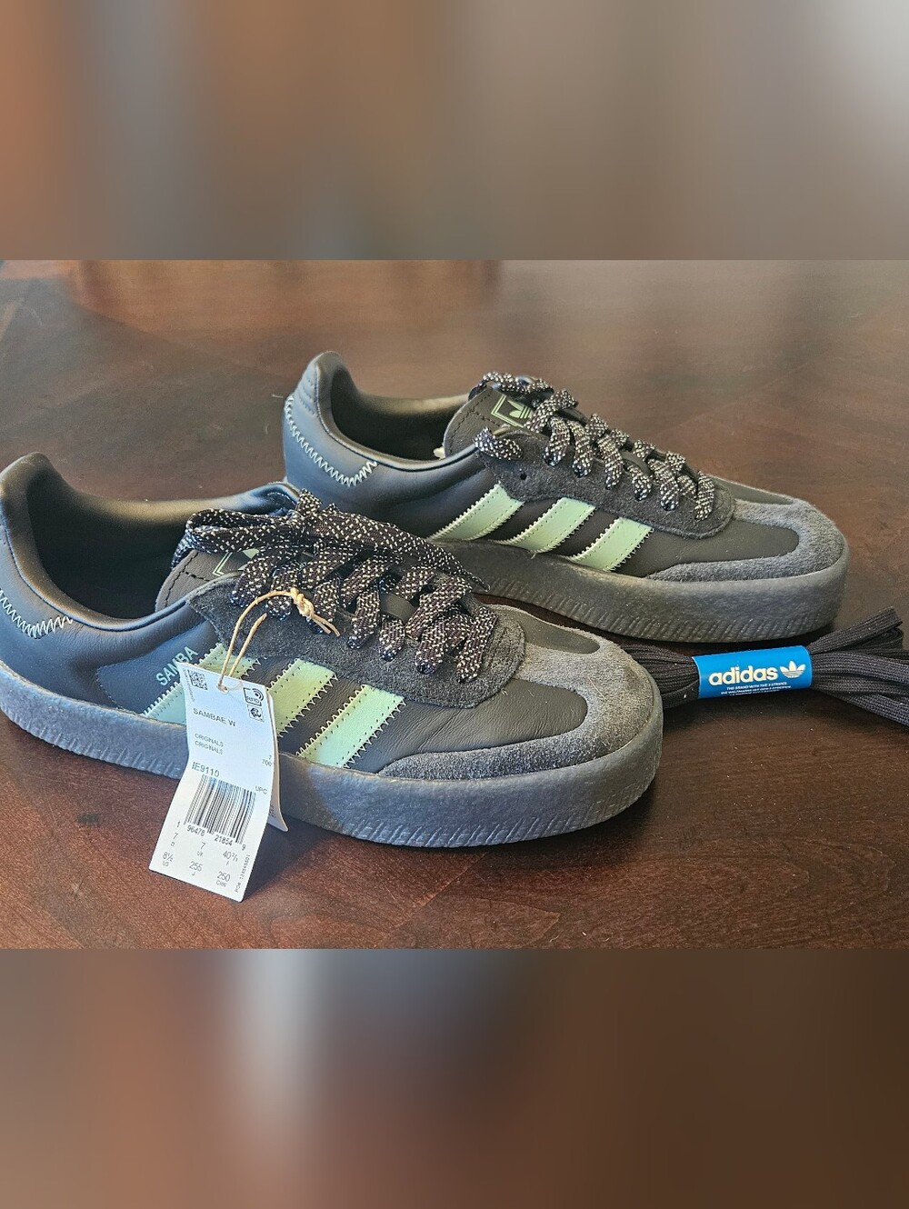 adidas Women’s Black Sneakers with Mint Green Stripes